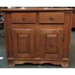 A Sardinian sideboard comprising two drawers over two cupboard doors, 99x53x90cmH