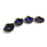 A set of four blue and gilt Herbiniere Tours pin dishes, in the form of scallops, 12cmD