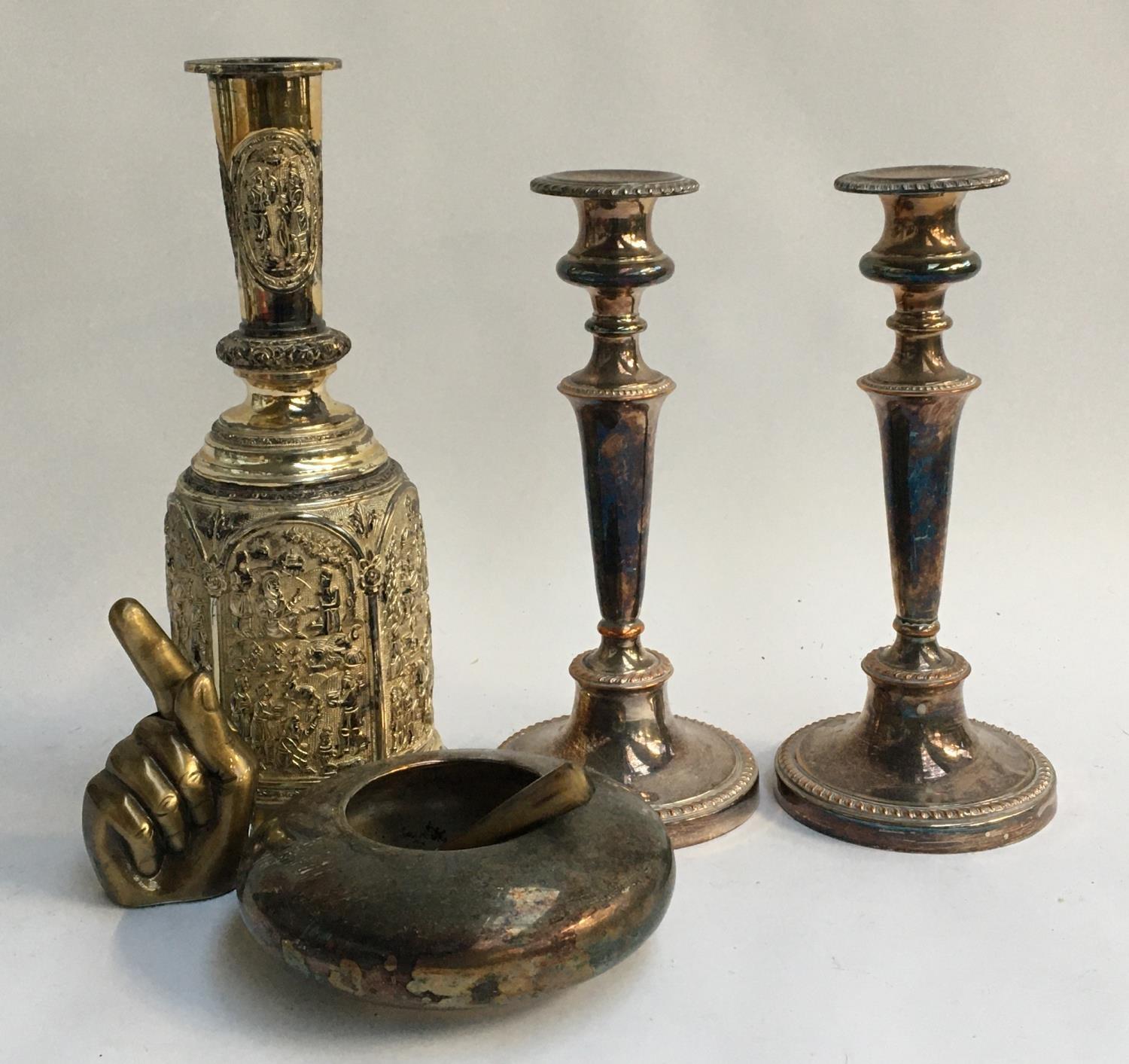 A pair of plated candlesticks, with removable bobeches; together with an Indian bowl, and Eastern