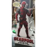 Two large advertising cutout boards for Deadpool DVD and Blu-ray and Red Dead Redemption PS4 and