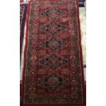 A modern Kashqai style Belgian rug, 160x80cm; together with a West Persian rug, 126x80cm