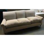 A good quality three seater sofa, upholstered in a grey fabric, approx. 215cmW