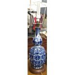 A blue Delft table lamp on turned wood base, approx. 40cmH