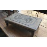 A low carved footstool, 42x25x12cmH