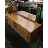 A mid-century style Meredew dressing table with mirror over six drawers, 132cmW