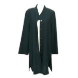 A Jean Muir green wool jacket and skirt, size 12; together with a Jean Muir wool slip dress, size