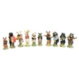 A Beswick 10 piece pig band to include Christopher, Thomas, Daniel, David, John (af), Andrew,