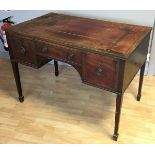 A 19th century mahogany kneehole desk, with tooled red leather skiver, one side with three drawers