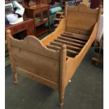 A single pine bed, approx. 95cmW