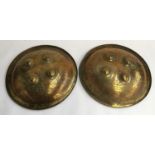 A pair of decorative Indian circular brass shields, 36cmD