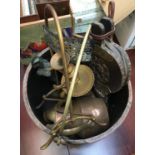 A copper kettle containing a quantity of metal items including candlesticks, kettle and stand,