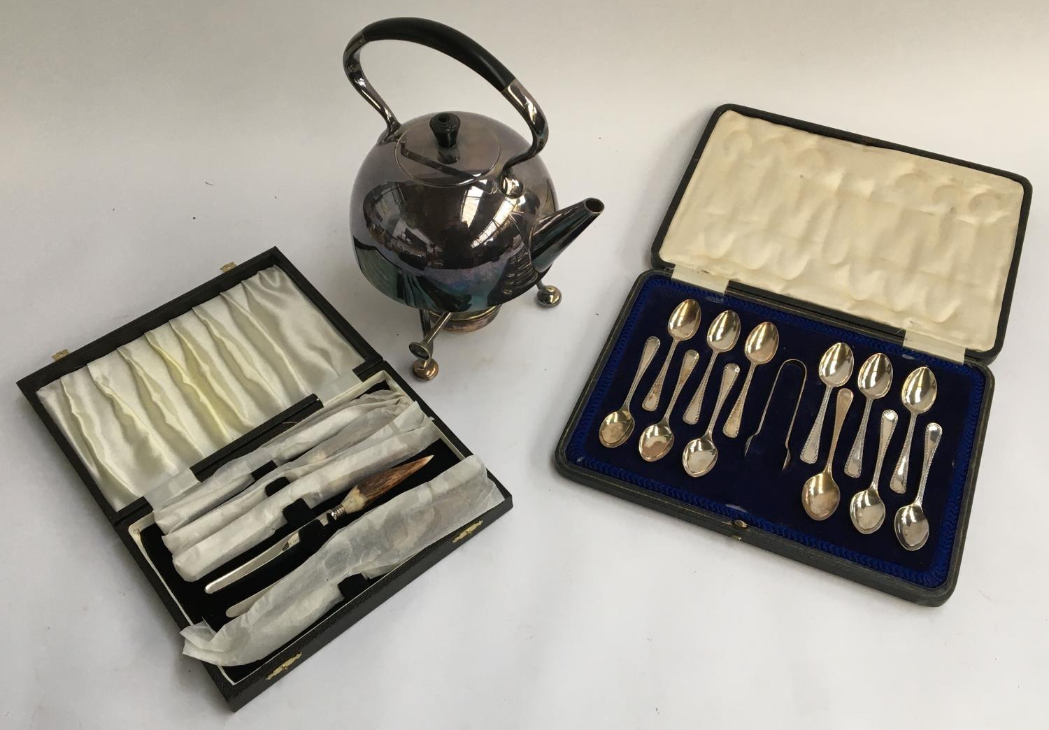 A good cased set of 12 silver teaspoons with sugar tongs, by Cooper Brothers, Sheffield, 1918;