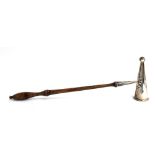 A silver candle snuffer, with turned wood handle, by Timothy Joseph Burtwell, London 1993