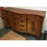 A serpentine mahogany sideboard, 153x54x91cmH