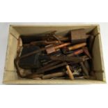 A wooden box of vintage hand tools, to include mallets, hammers, jigsaw, spoke shave, screwdrivers