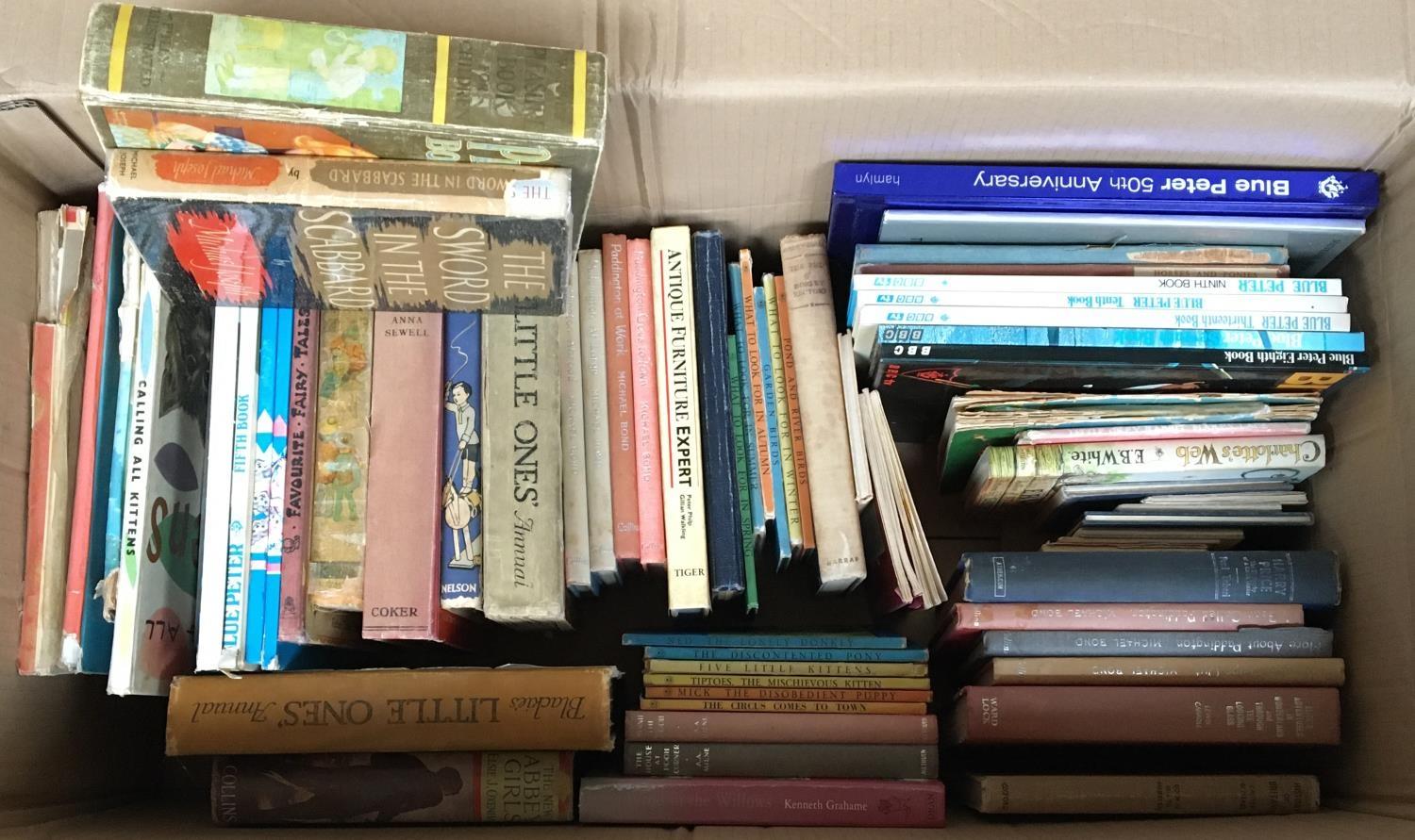 A good box of children's books to include various annuals, Michael Bond, Paddington, Ladybird books,