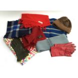 A mixed lot to include a Marilyn Anselm for Hobbs scarf; a vintage school scarf; red leather