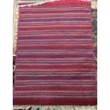 Two striped Persian rugs purchased in Oman, each 97x136cm