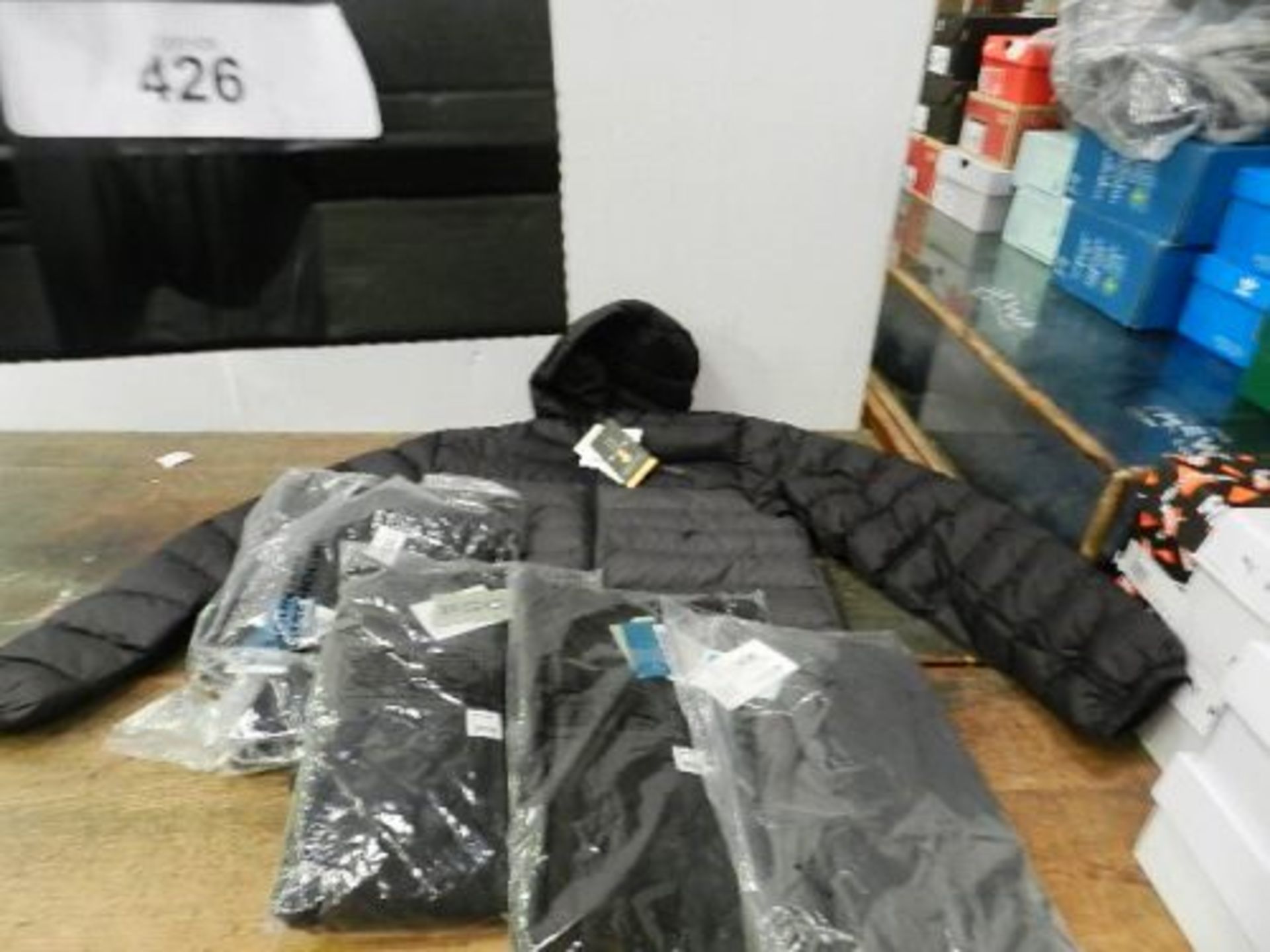 A quantity of Mountain Warehouse adult clothing including fleeces, waterproof trousers, padded