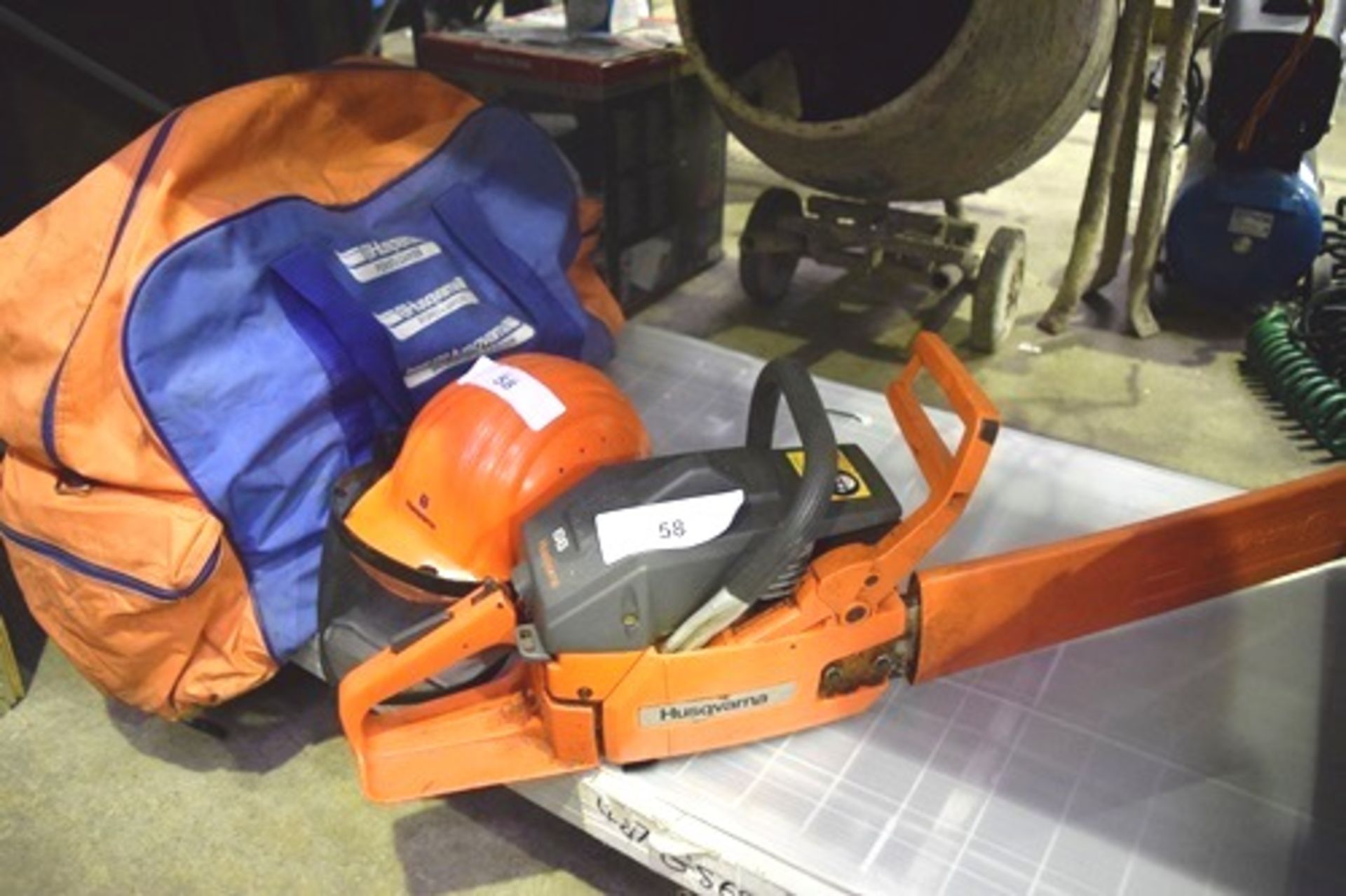 Husqvarna petrol chain saw, model 66, engine seized, Husqvarna safety helmet and safety clothing -