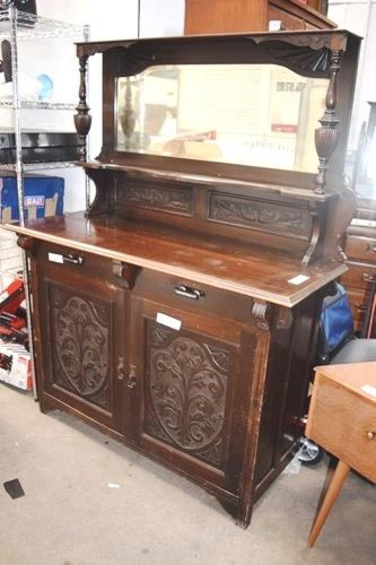 A late Victorian English mahogany mirror-backed sideboard, carved decoration 52"(W) x 21"(D) x 68"(