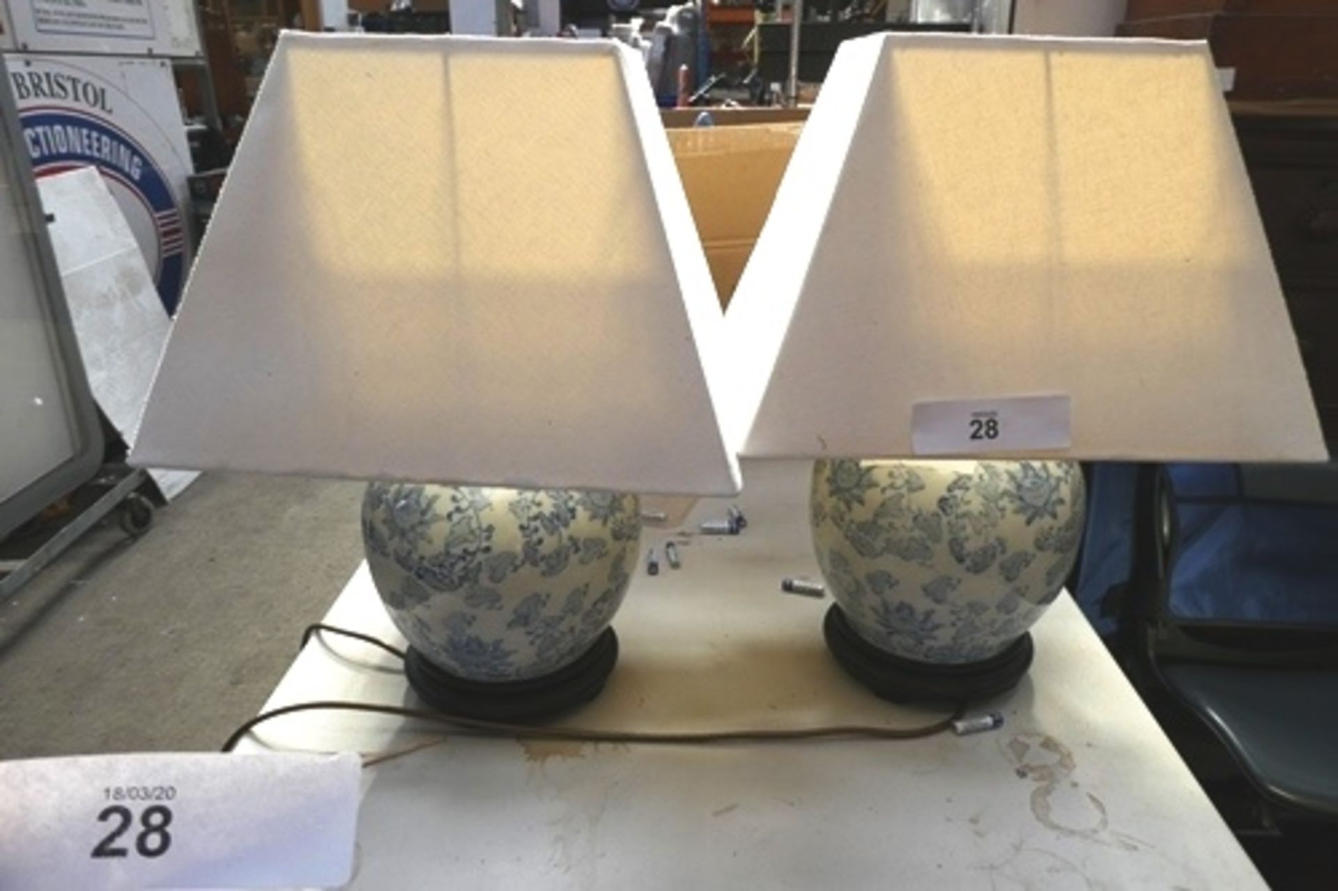 A pair of Chinese blue and white pottery bulbous shape lamp bases with off white rectangular lamp - Image 2 of 2