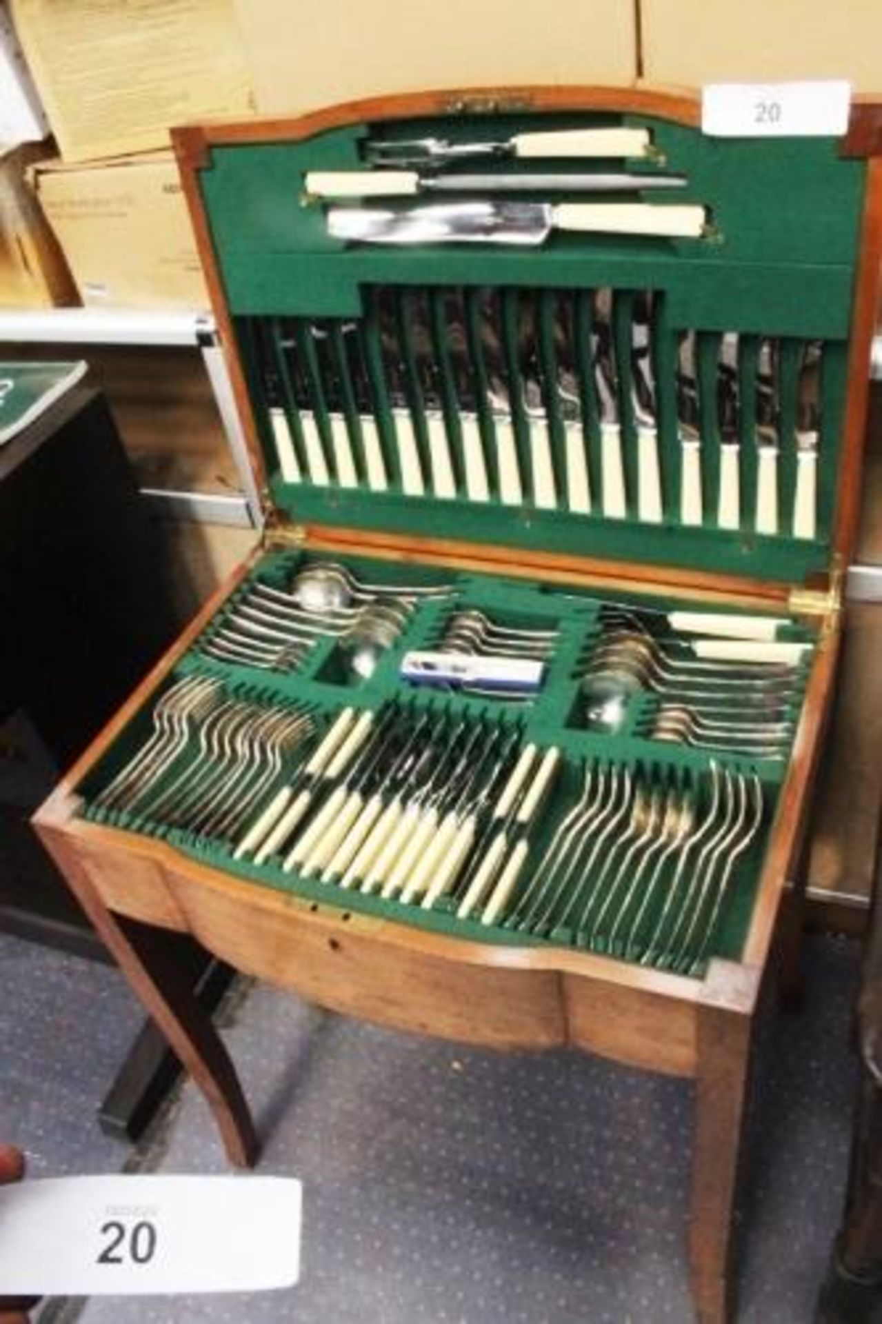 An English 8 setting canteen of silver plate cutlery, in walnut bow fronted chest - Second-hand (