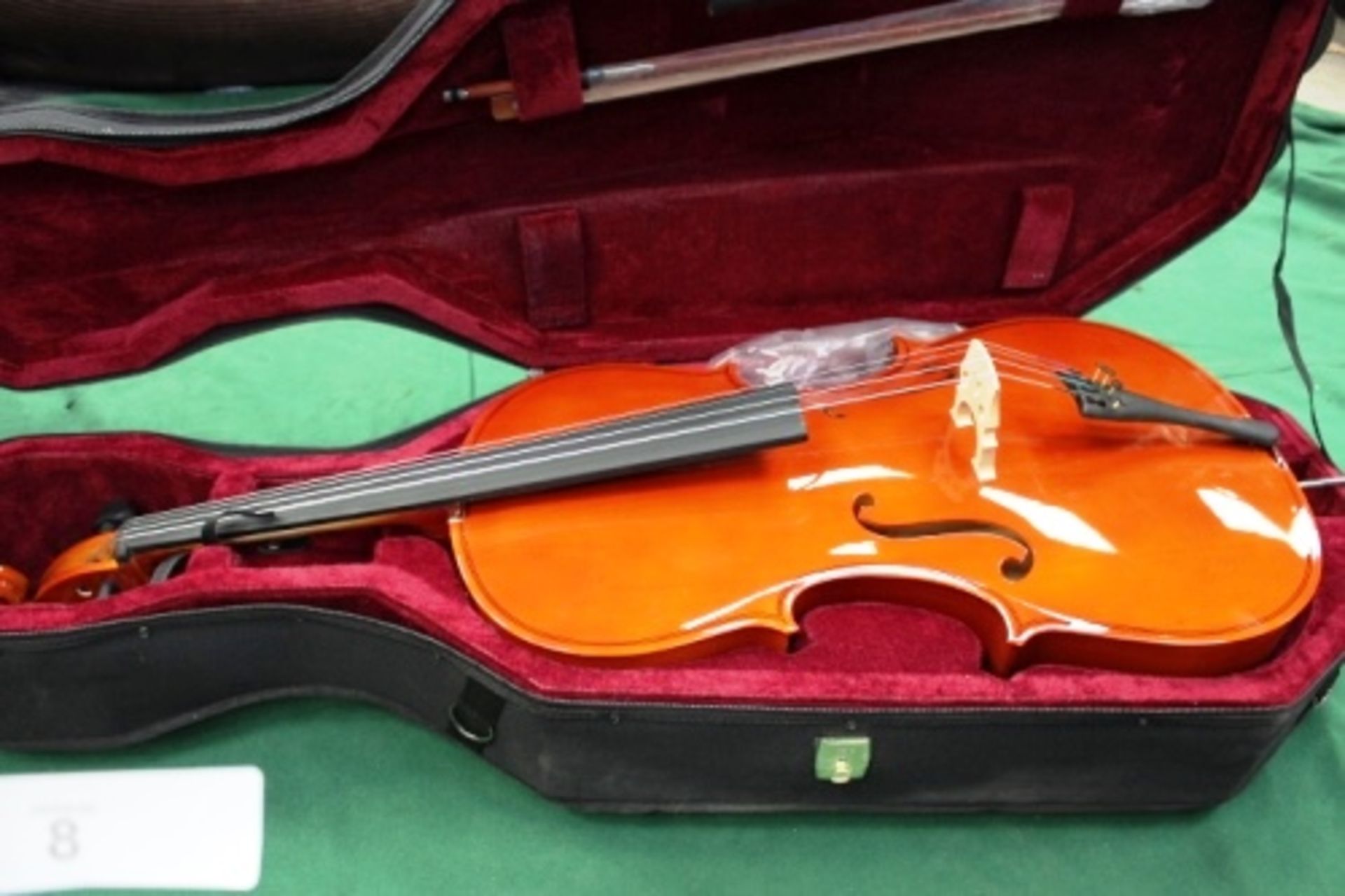 A cello with repaired neck, comes with carry case, music stand and spare strings - New (cabsfloor)