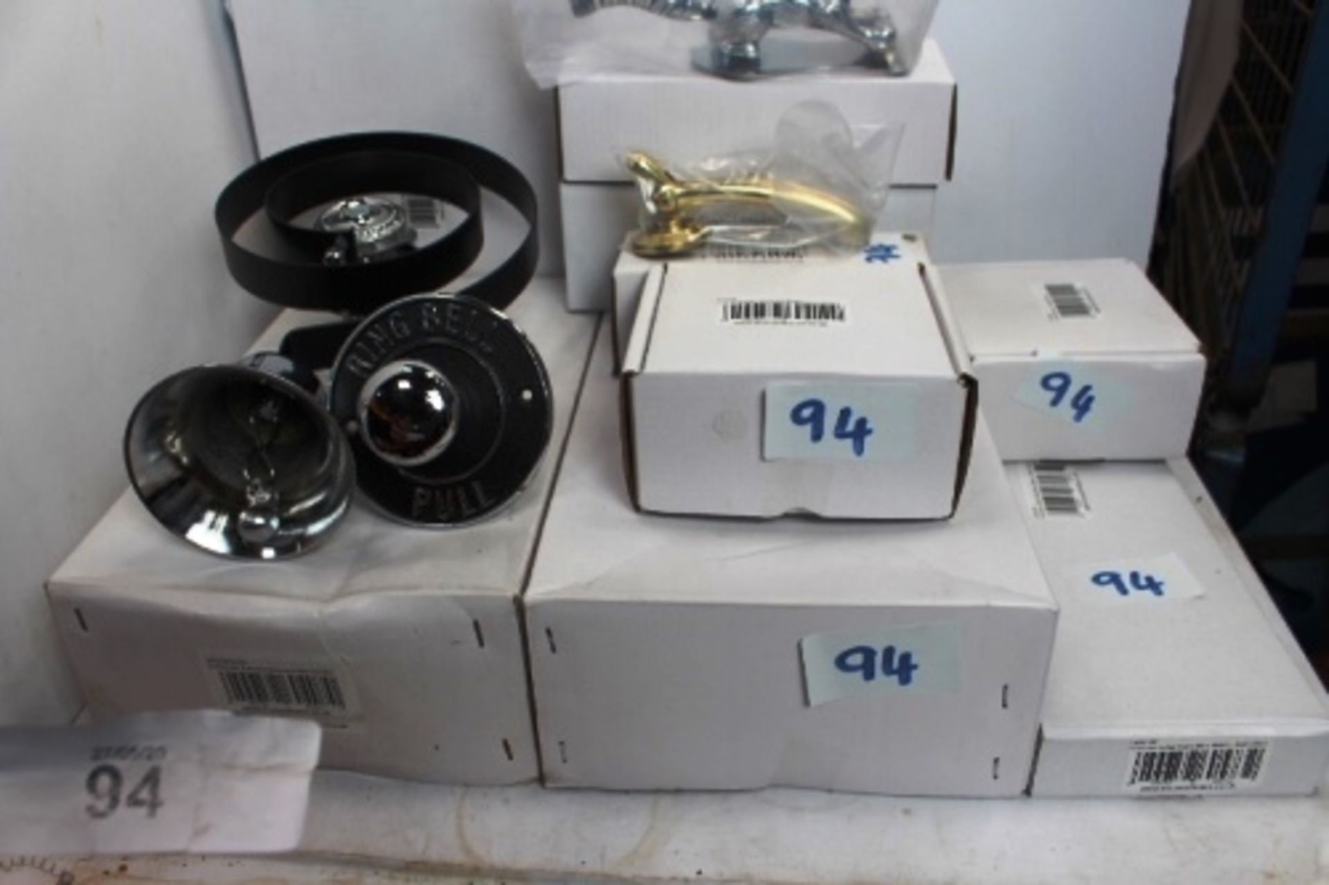 A quantity of houseofbrass.co.uk front door hardware including 3 x butlers bells, round embossed