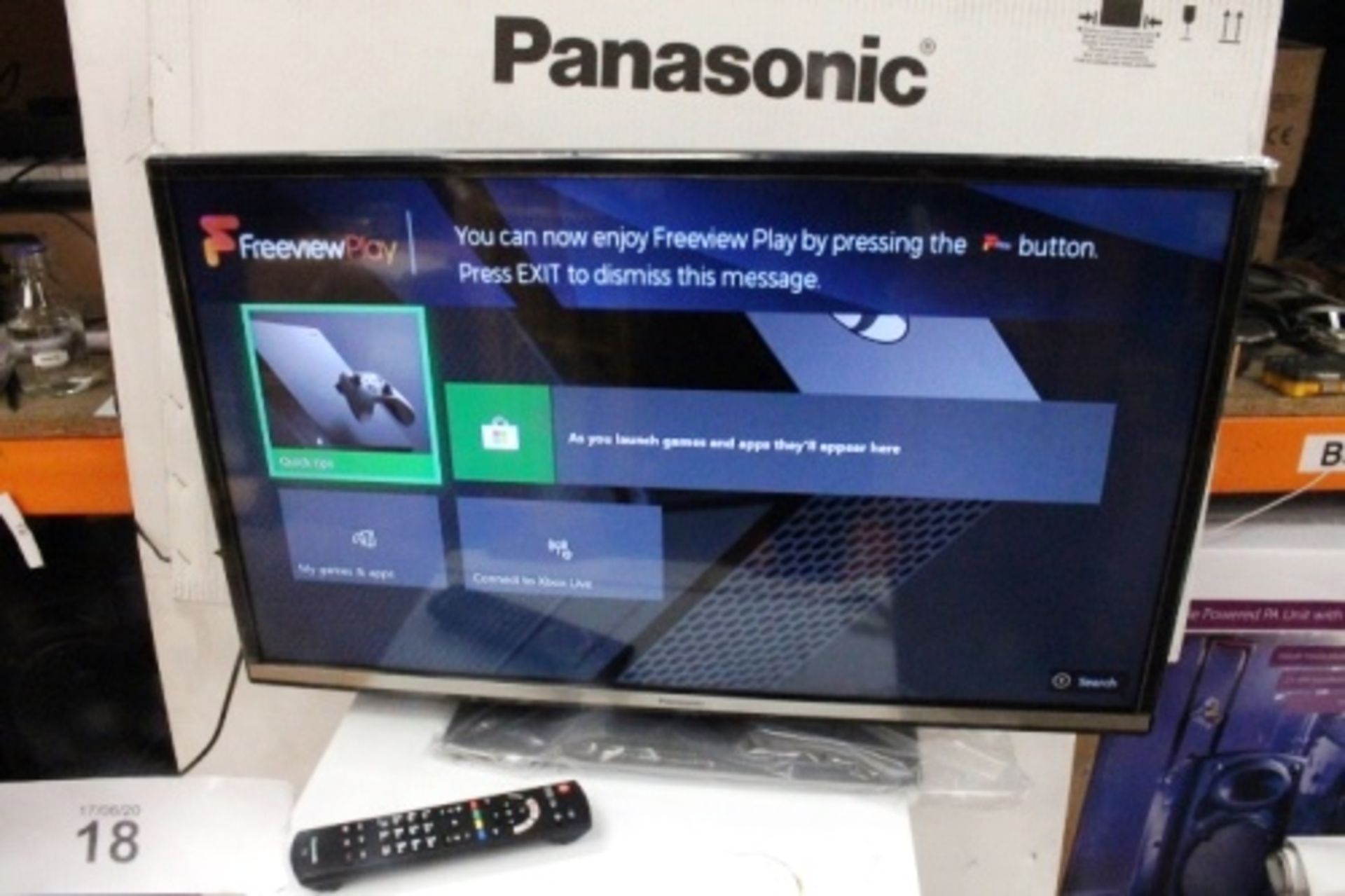 A Panasonic 32" TV, model TX-32GS352 B - New in box, checked and complete (ES18)