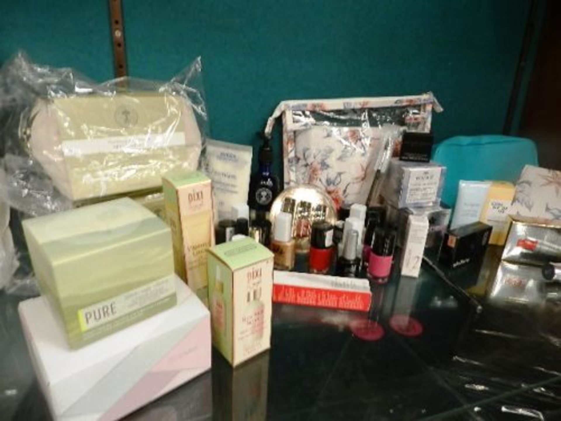 Over 30 items of beauty creams, cosmetics and nail polish including 2 x Neals Yard skin care kit,