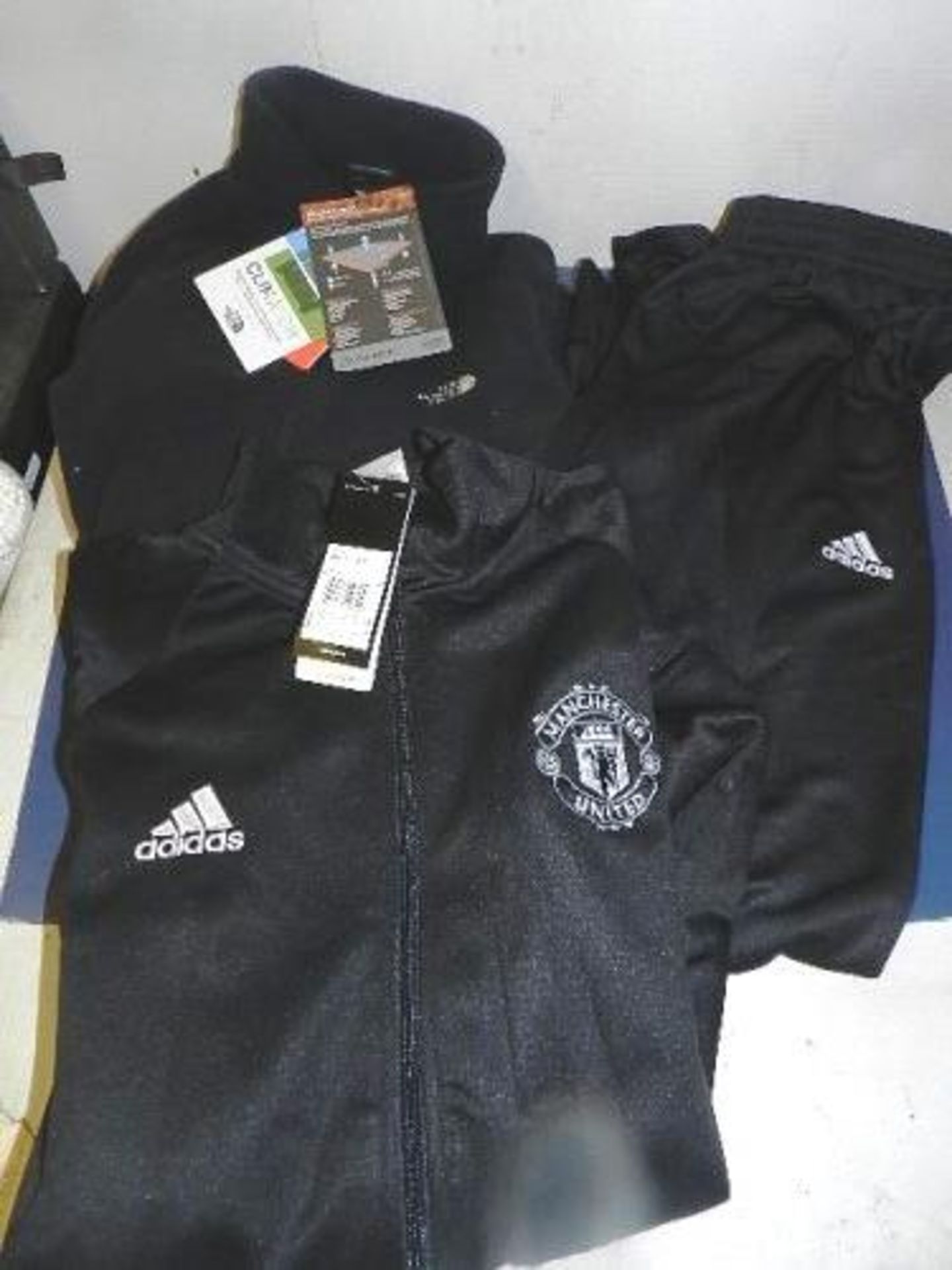 1 x North Face Glacier full zip size M and 1 x Adidas Manchester United tracksuit, size XL - New (