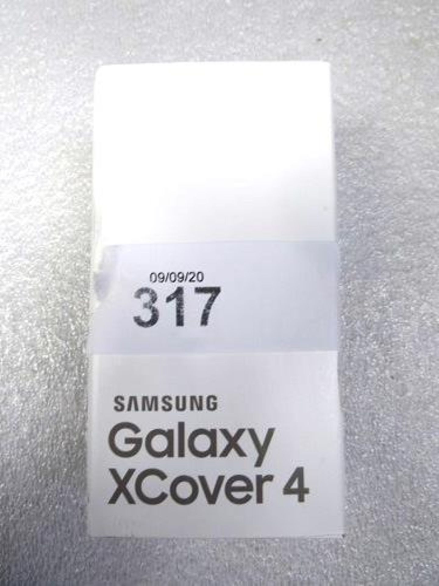 A black Samsung 16gb Galaxy XCover 4 smart phone, model SM-G390F, IMEI: 355215/10 559688/1 -