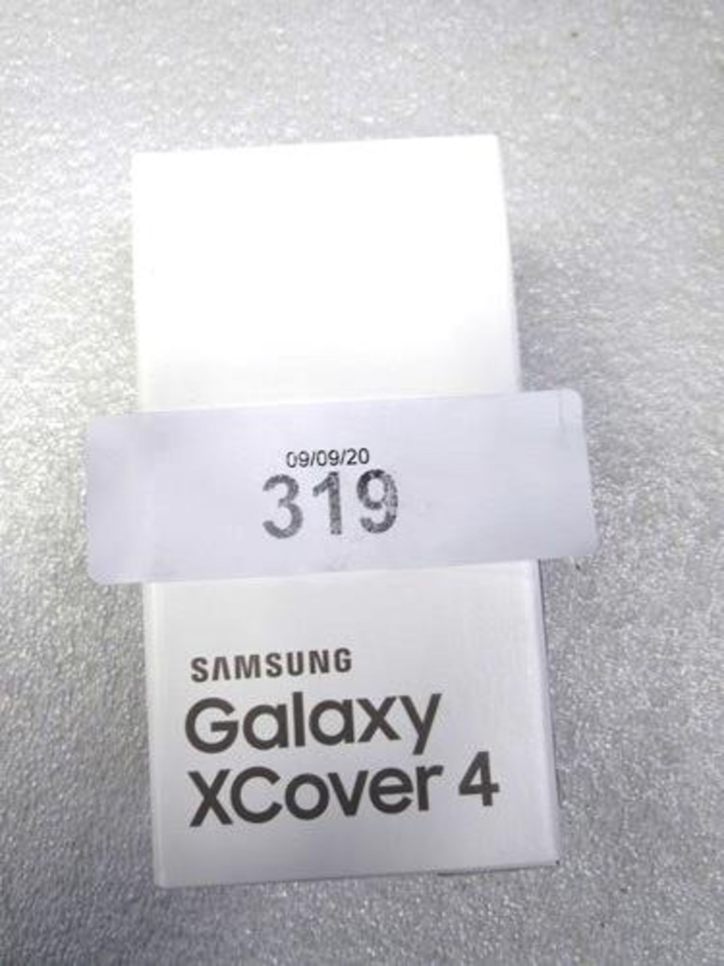 A black Samsung 16gb Galaxy XCover 4 smart phone, model SM-G390F, IMEI: 355215/10 560205/1 -