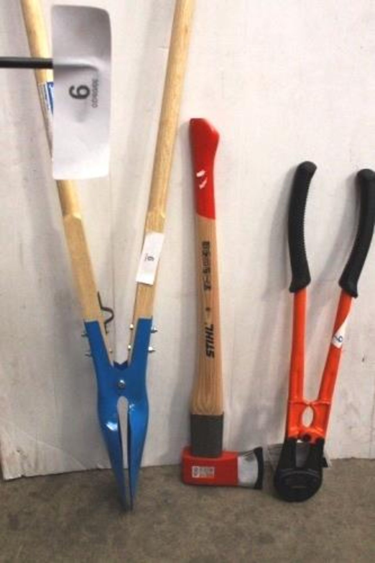 1 x Stihl AX28CS axe 1 x pair of Bahco bolt cutters, 750nn No. 2 and 1 x Silverline post hole