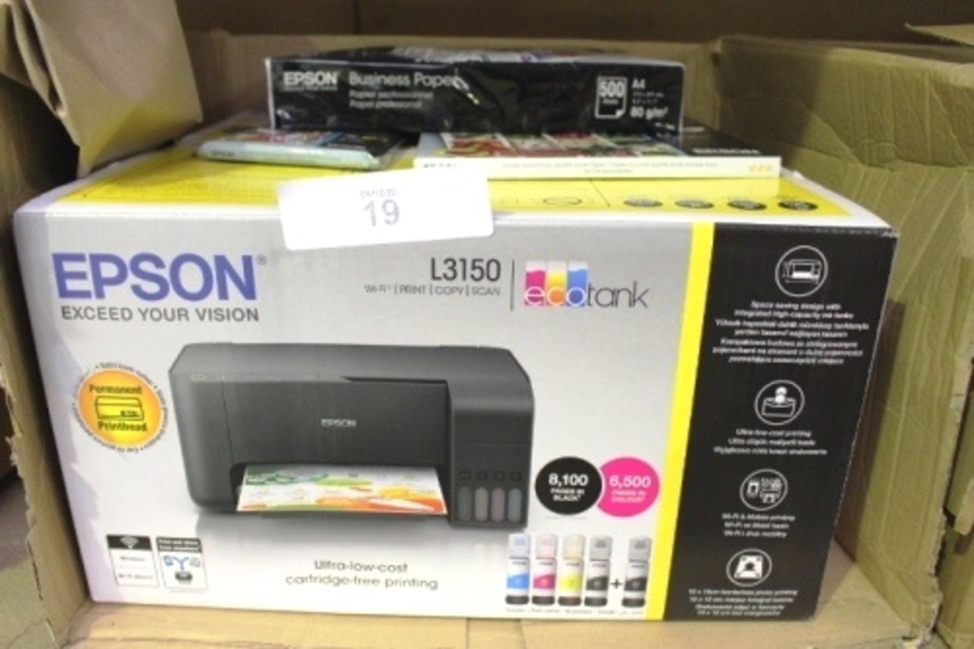 An Epson home printer, model L3150, together with a selection of Epson paper - Sealed new in box (