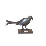 A tinware model of a parrot