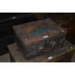 A pine trunk and metal bound workbox