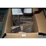 A box containing various vintage door locks etc.