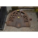 An Ogle cast iron vintage tractor seat