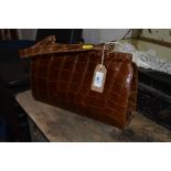 A 1960's/70's crocodile skin vintage handbag