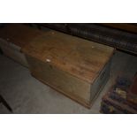An old stripped pine storage box