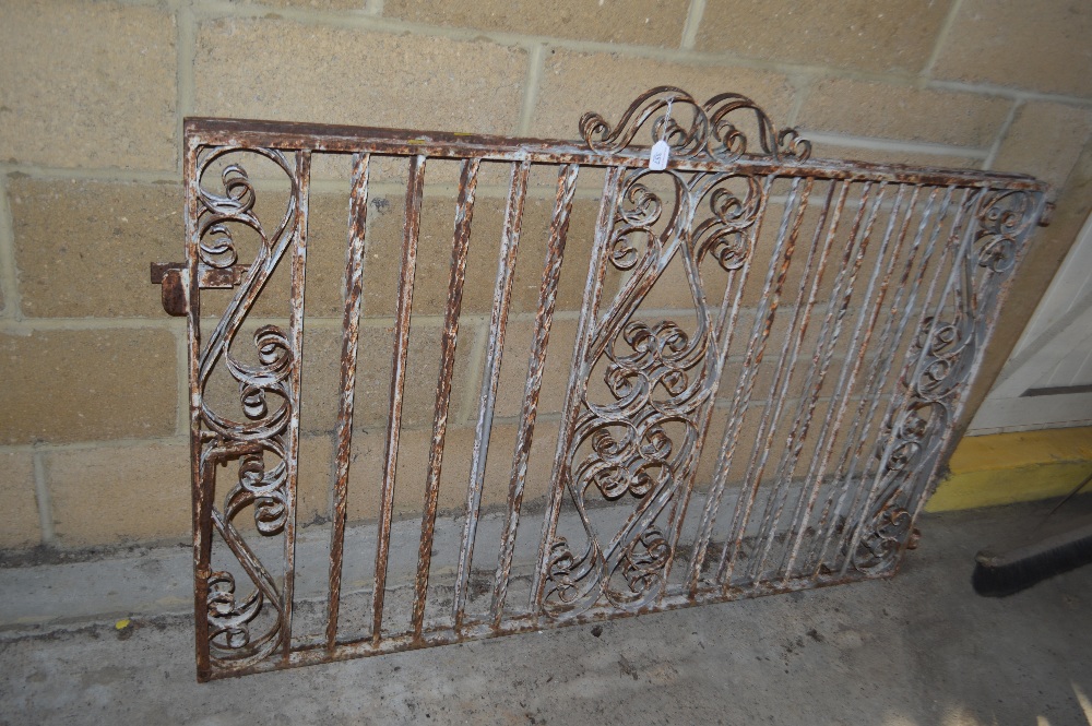 A large pair of wrought iron gates
