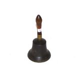 An Antique hand bell with turned wooden handle