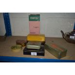 A quantity of various advertising tins and an Isovac