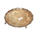 A silver plated card tray, bearing family crest an
