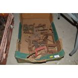A box of various old clamps