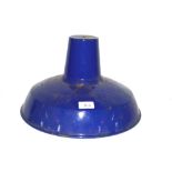 A vintage enamel ceiling light shade