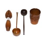 Two treen Toddy ladles, a flower carved beaker and