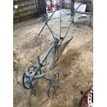 A Howard of Bedford horse drawn ridging plough wit